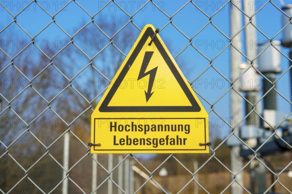 Yellow sign High voltage Danger to life