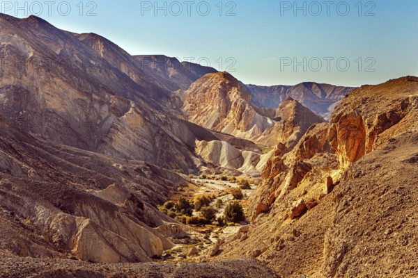 Magnificent sandstone multi-colored rocks. The Timna Valley in the south of the Arava Desert, near the resort of Eilat. Israel. Hot November day