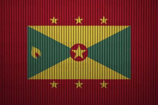 Grenada Flag painted on the cracked grunge concrete wall