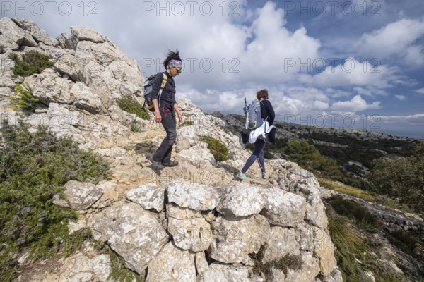 Walkers on the road, archduke path, Valldemossa, Majorca, Balearic Islands, Spain, Europe