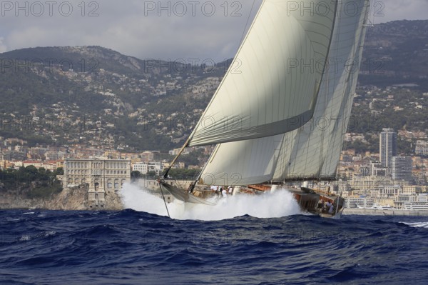 90-year-old sailing yacht Three-masted topsail schooner XARIFA sails during Monaco Classic Week. The 50-metre-long ship was built in 1927 by the British shipyard Samuel White for the sewing machine manufacturer Singer
