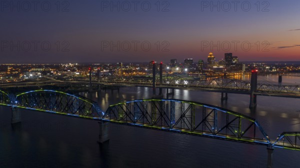 Multi Colors of light hit the Big Four bridge before sunrise around Lousville Kentucky
