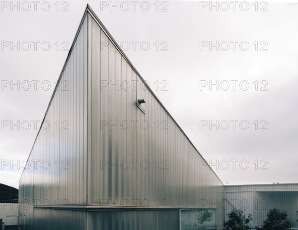 Angra do Heroismo, Portugal, July 1, 2022: New building of modern architecture with U-glass facade containing the Luis da Silva Ribeiro public library, Europe