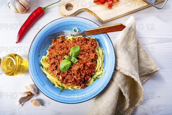 Delicious spaghetti bolognese on a white background