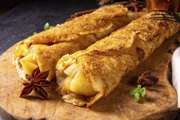 Tasty autumnal omas pancakes with apple and cinnamon