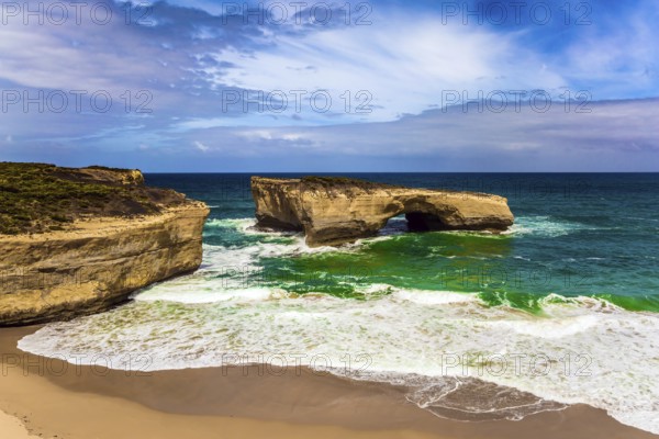 Fantastically picturesque Pacific coast of Australia. White surf foam and azure waves. The concept of exotic, active and photo-tourism