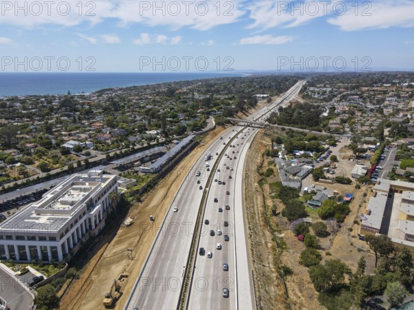 Aerial view of highway transportation with small traffic, highway interchange and junction, San Diego Freeway interstate 5, California