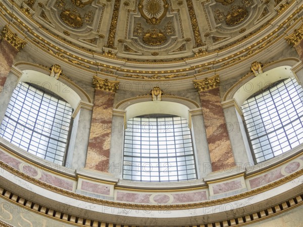 Detailed baroque ceiling with gilded decorations and large windows inside a historic building, esztergom, danube, hungary