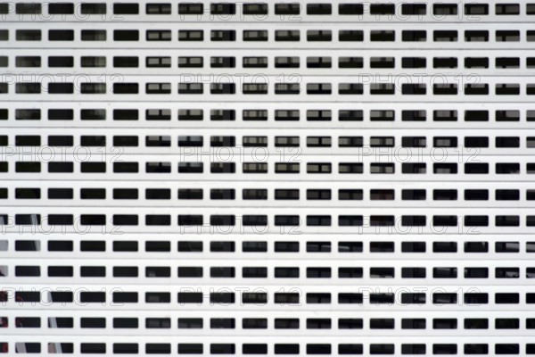 A closed jewellery shop with lowered window blinds