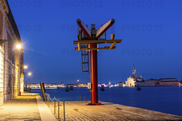 Loading crane on the quay, backlit church of San Giorgio Maggiore, blue hour, Venice, UNESCO World Heritage Site, Veneto, Italy, Europe