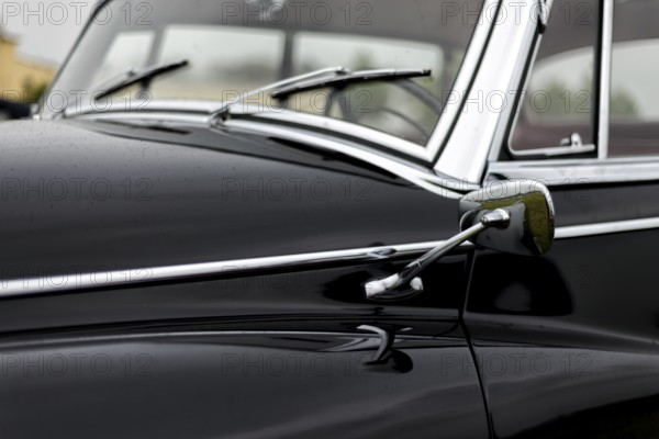 Details of a classic car in a museum