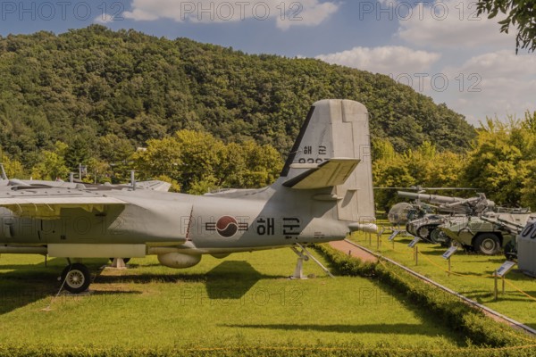 Daejeon, South Korea. September 19, 2019: Grumman S-2e tracker aircraft along with other military vehicles on display at National cemetery