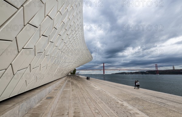 LISBON, PORTUGAL, October 19, 2018: The modern MAAT (Museu de Arte, Arquitetura e Tecnologia) building with futuristic architecture in Lisbon, Portugal in the evening