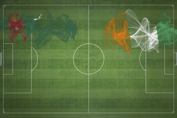 Turkmenistan vs Ivory Coast Soccer Match, national colors, national flags, soccer field, football game, Competition concept, Copy space