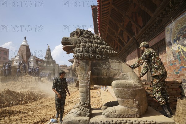 Army and police personnel clear debris, earthquake, nepal, asia