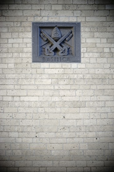 Cologne, Germany - November 24, 2016: The coat of arms of St. Kunibert Basilica embedded in the church façade on November 24, 2016 in Cologne