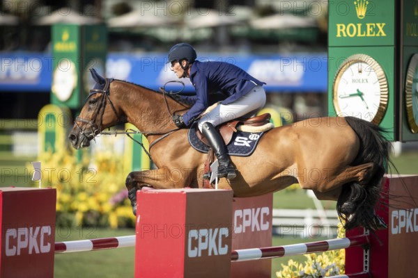 German rider Daniel Deusser riding Killer Queen VDM competes in the second round and jumpoff of the CPKC International GP at Spruce Meadows Masters, in Calgary, Alberta, Canada, North America