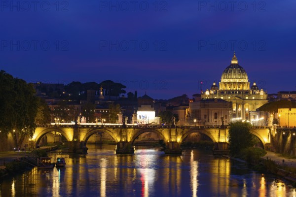 Sunset view of St. Peter's Basilica, Ponte Sant'Angelo, and Tiber River in Rome, Italy, Europe