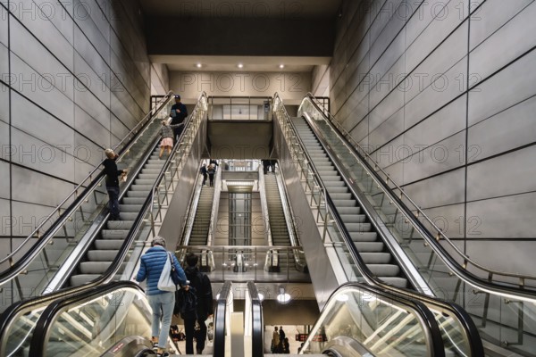 Copenhagen, Denmark, August 12, 2016: People using escalators in the subway of Copenhagen. Blur motion, Europe