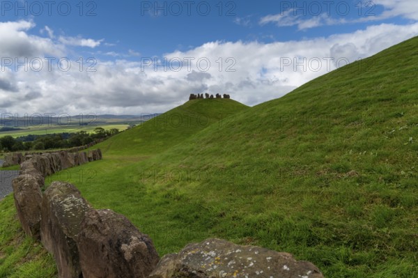 View of the Andromeda hill with stone circle in the Crawick Multiverse in Dumfries and Galloway