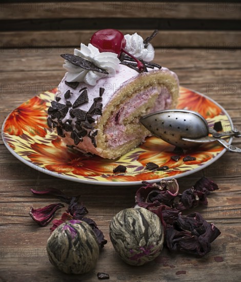 Chopped baked dessert on the background of the tea infuser