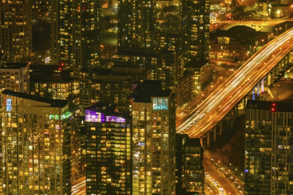 Highway and buildings at night. Shooting Location: Toronto
