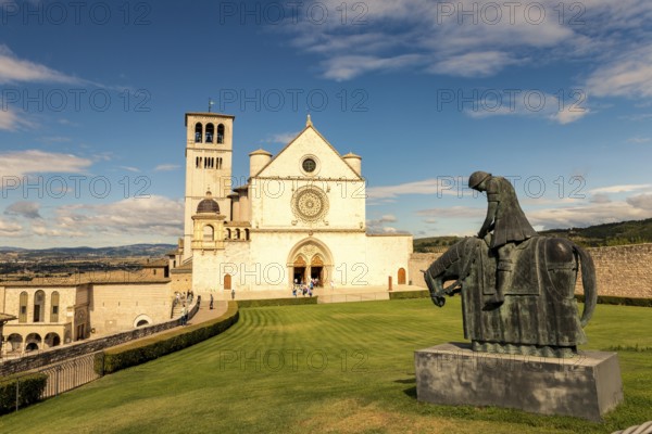 St. Francis of Assisi Church with the statue of St. Francis on a horse in the foreground. Francis is the patron saint of Italy. The bell tower can be seen from miles away