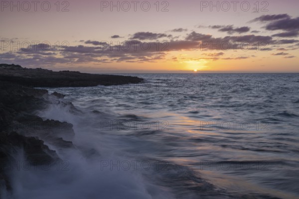 Peaceful sunrise seascape at Cap de ses Salines on Mallorca's southernmost point