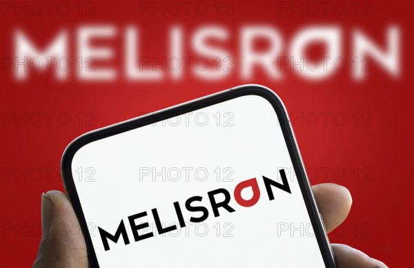 Melisron logo is displayed on smartphone. Melisron Ltd is an Israel based investment company