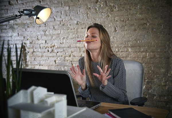 Funny businesswoman chat pencil mustache expression on laptop comuter