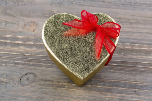 A box for a gift in the shape of a heart. Symbolic photo for Valentine's Day, wedding anniversary, engagement. Austria