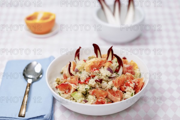 Quinoa salad with blood oranges, radiccio, cucumber and olives