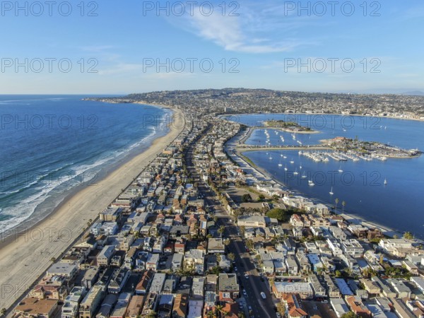 Aerial view of Mission Bay and Beaches in San Diego, California. USA. Community built on a sandbar with villas, sea port and recreational Mission Bay Park. Californian beach lifestyle