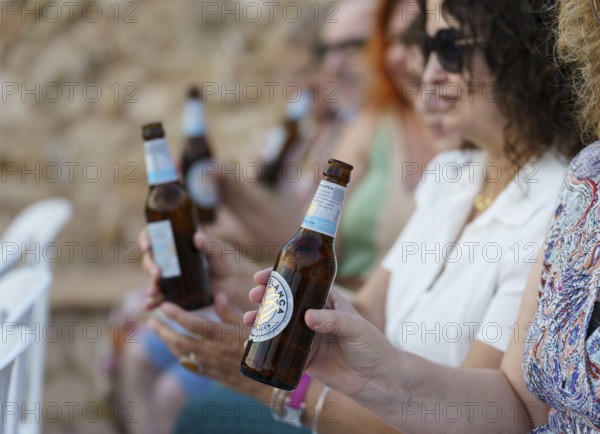 Middle-aged women drinking beer, Fortí, Cala d?Or, Santanyí, Majorca, Balearic Islands