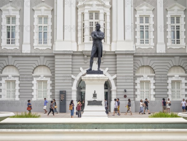 Bronze statue of Stamford Raffles by Thomas Woolner in front of the Victoria Theatre and Concert Hall, Singapore, Asia