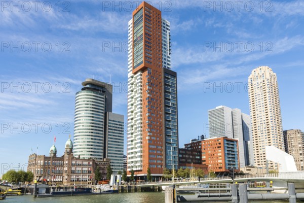 Rotterdam, Netherlands, September 2019: View on the Wilhelminapier with skyscrapers, Landverhuizersplein, Montevideo tower, Rijnhavenbrug and famous hotel New York