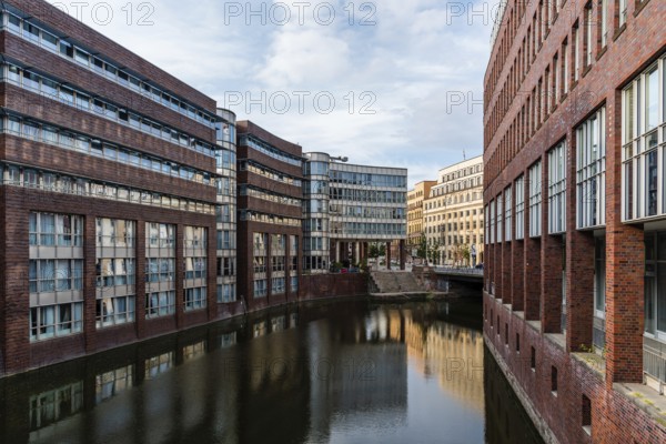 Hamburg, Germany, August 4, 2019: Scenic view of Bleichenfleet Canal in Hamburg view at sunset, Europe