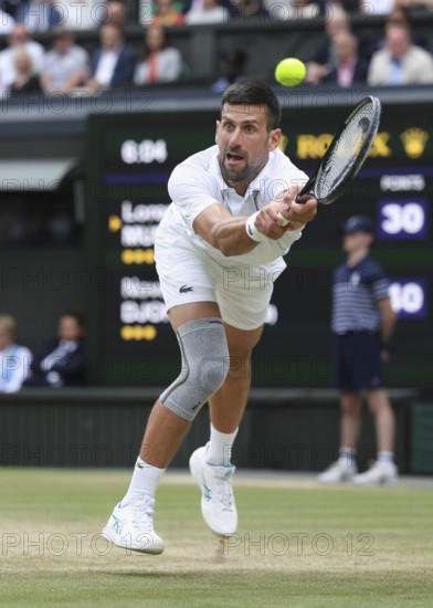 Serbian tennis player Novak Djokovic in action at the 2024 Wimbledon Championships, London, England, United Kingdom, Europe