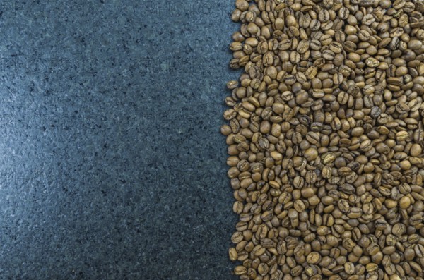 Texture, background of whole coffee beans, raw