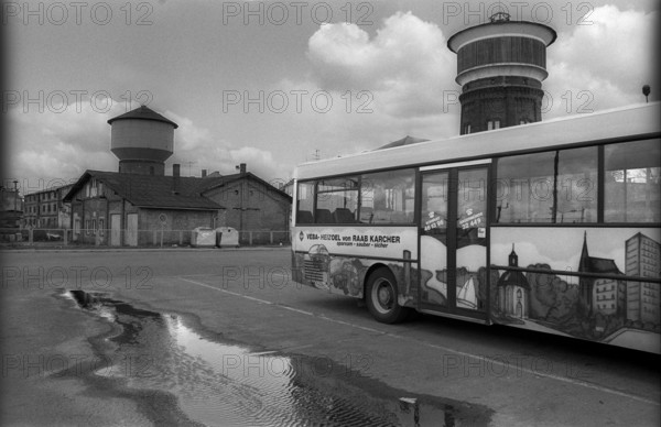 Germany, Angermünde, 20/04/1992, bus station, bus, puddle, Europe