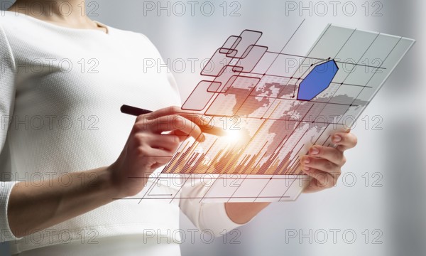 Woman hand touching virtual screen with pen. Online project management and financial diagrams visualization. Modern business innovation and intelligence technology. Data analysis futuristic concept