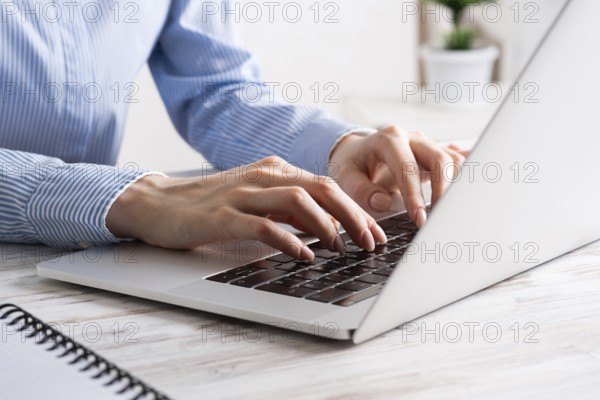 Office manager working with laptop. Corporate office workplace with computer. Business occupation concept with business woman at vintage wooden desk. Career development and success