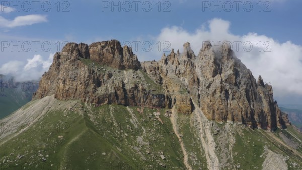Aerial view on Naujiza or Mother-in-law teeth mountain with fantastic cliffs in Kabardino-Balkaria, Caucasus, Russia, Europe