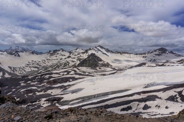 Beautiful landscape with snow covered peaks of the Caucasus Mountains, Russia, Europe