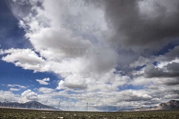 Wind turbines during a storm on Highway 50, Loneliest Road in America, Ely, Nevada, USA, North America