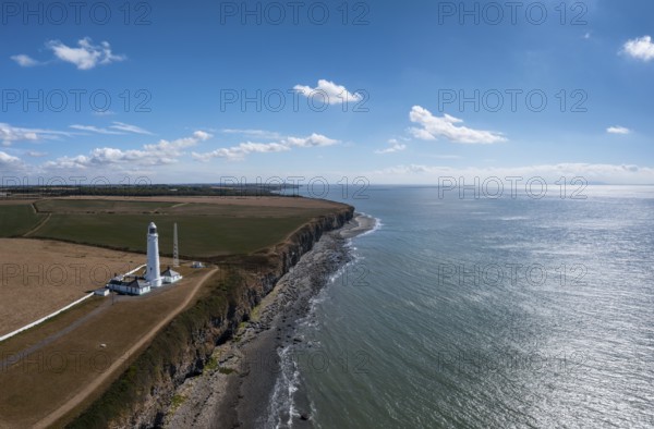 Aerial landscape view of the Nash Point Lighthouse and Monknash Coast in South Wales, United Kingdom, Europe