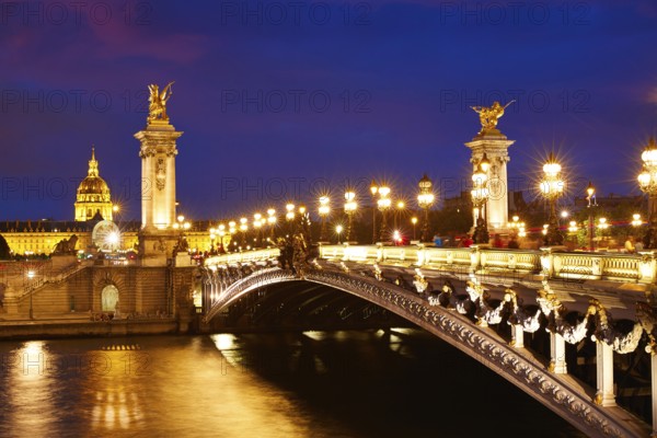 Pont Alexandre III in Paris France sunset over Seine river