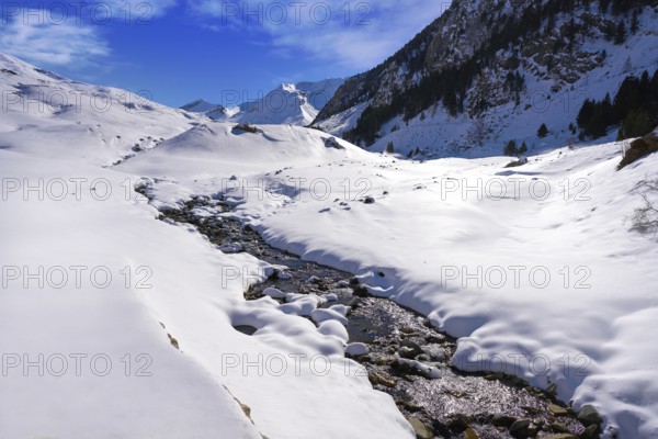 Cerler snow stream in Pyrenees of Huesca in Spain