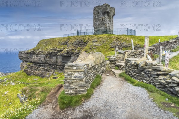Old Moher Tower on Hags Head, watchtower at the southern end of Cliffs of Moher, popular tourist attraction, Wild Atlantic Way, County Clare, Ireland, Europe