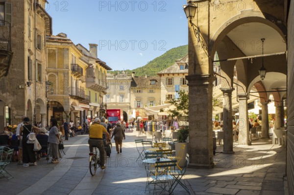 The city of Domodossola is a famous regional centre in Northern Italy, surrounded by mountains. Situation of the historic main square in the old town